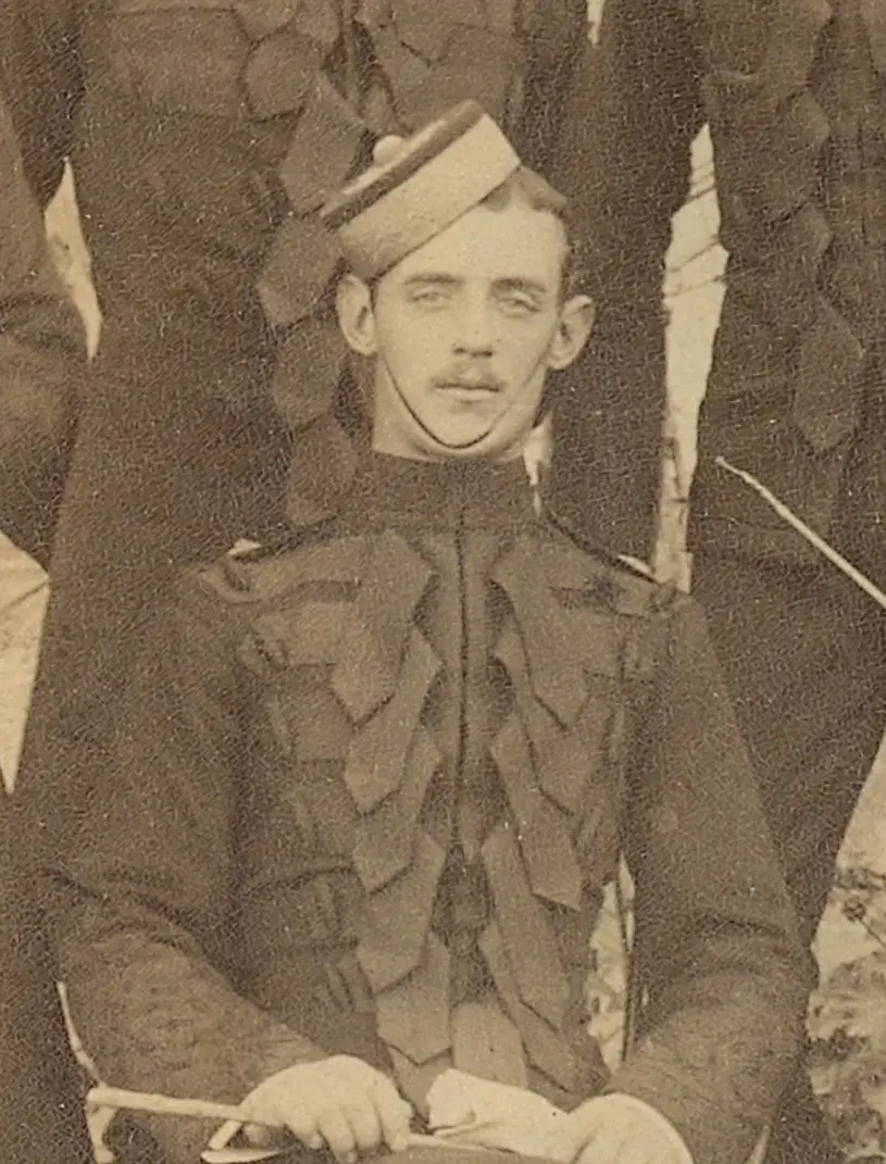 Sepia photograph of young man in Victorian military uniform