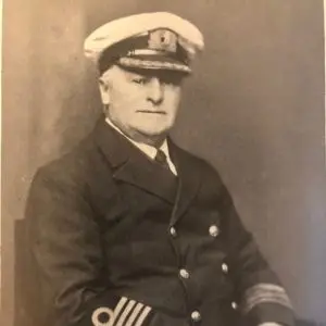 Photographic portrait of Captain Phillips, in Clan Line Captain's Uniform