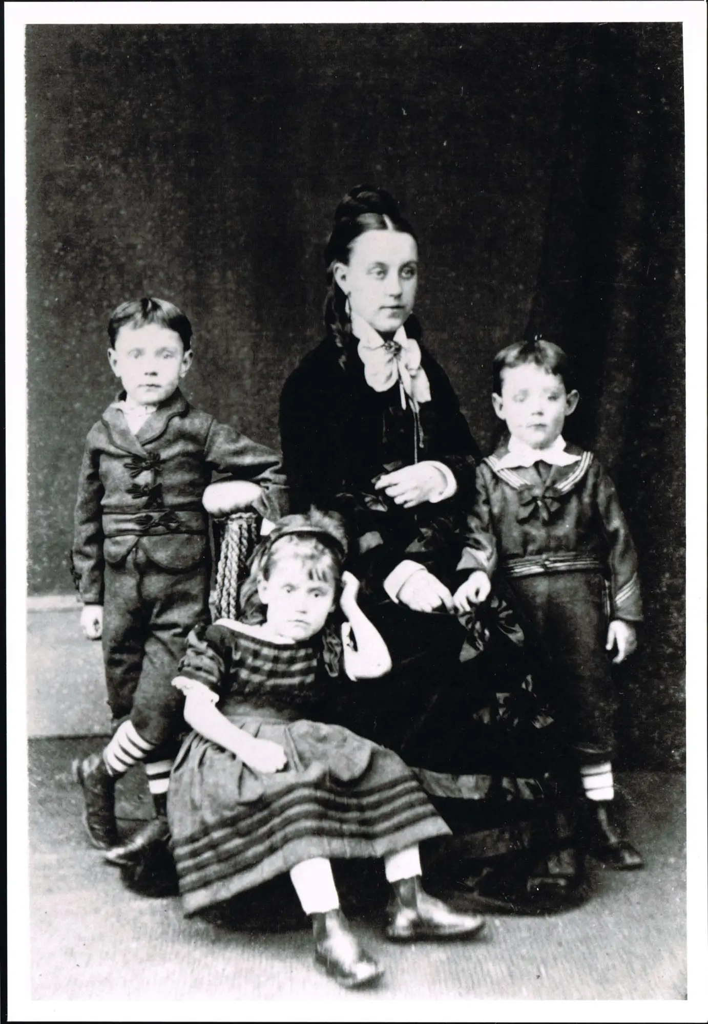 Black and white photograph of Agnes Cayzer with her three eldest children, Charles, Mamie and Jack in 1873