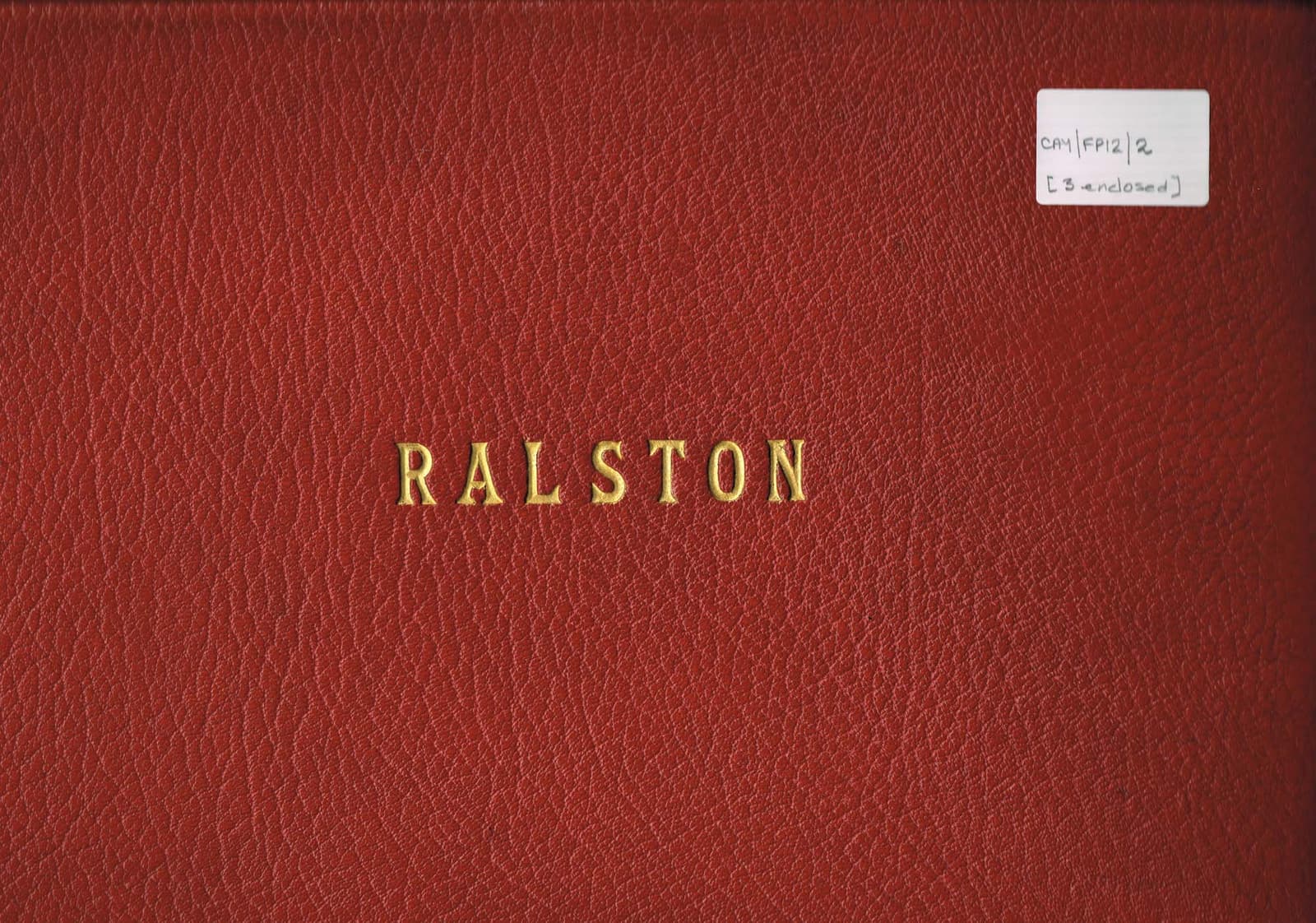 Colour photograph of album of prints of the interior of Ralston